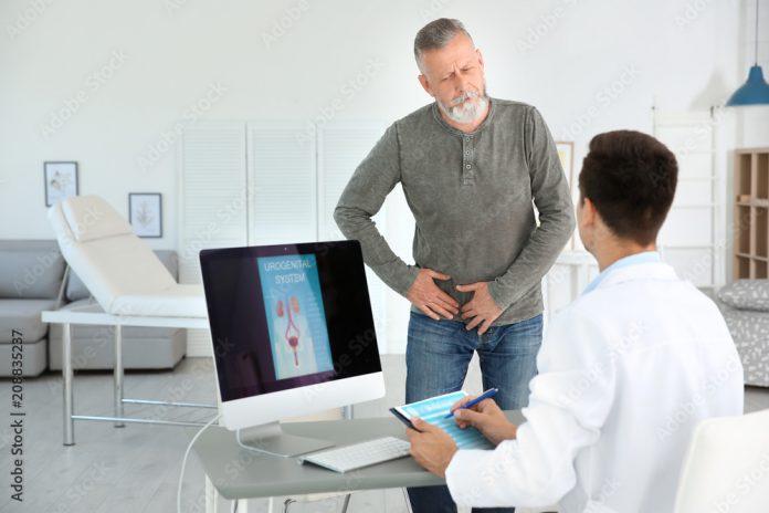 Man with prostate health problem visiting urologist at hospital.